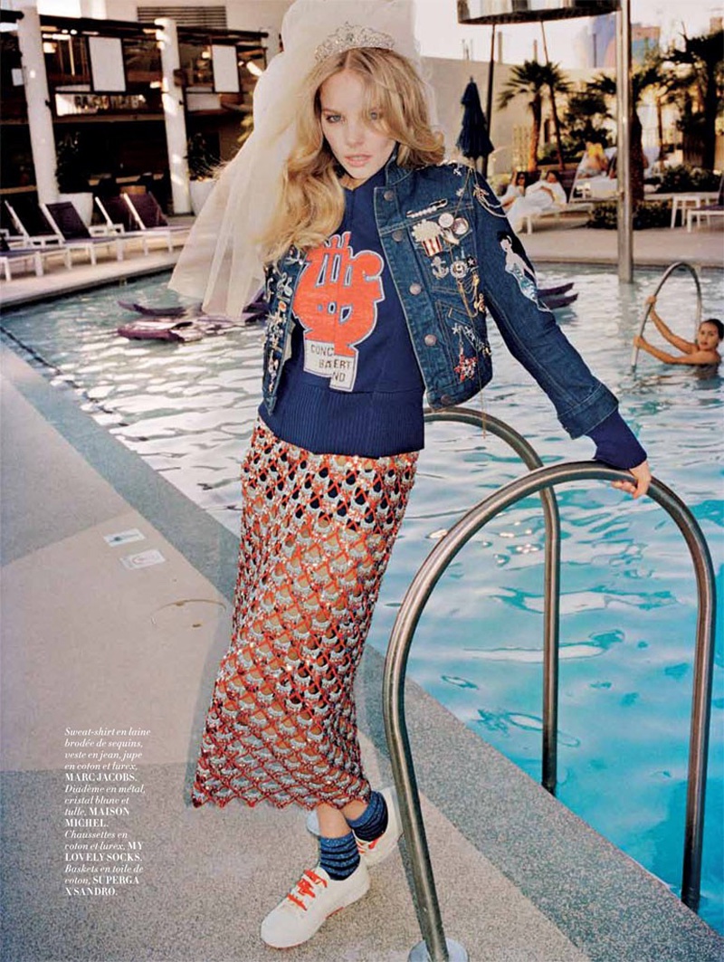 Posing at the pool, Marloes Horst wears Marc Jacobs denim jacket, sweater and skirt