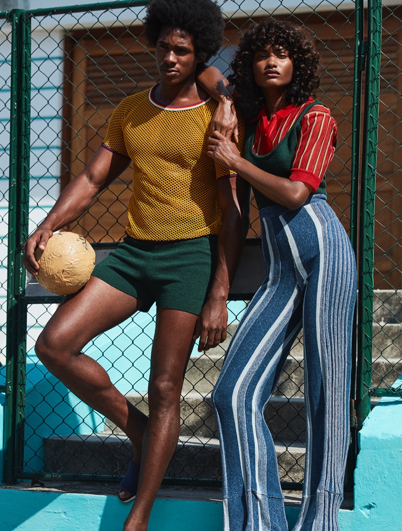 Melodie Monrose serves seventies vibes in striped shirt, knit top and high-waist trousers