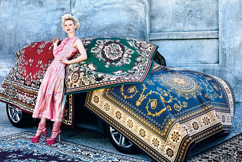 Posing with rugs, Mia Wasikowska wears pink Chanel dress and pink Gucci platform heels