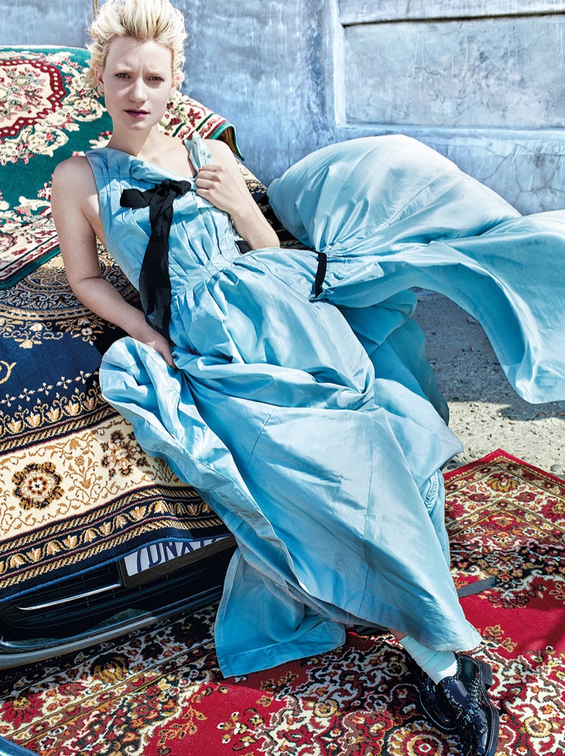 Maia Waskowskia channels her Alice character in a blue Oscar de la Renta gown with Louis Vuitton oxfords