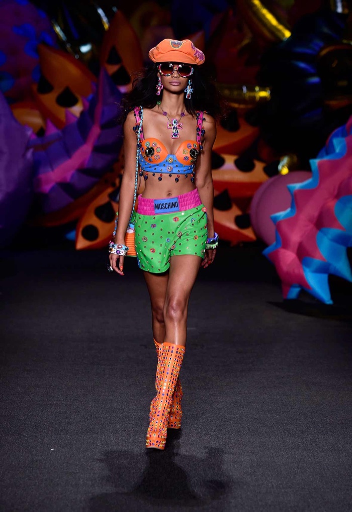 Moschino Resort 2017: Chanel Iman walks the runway wearing an embellished bustier with shorts