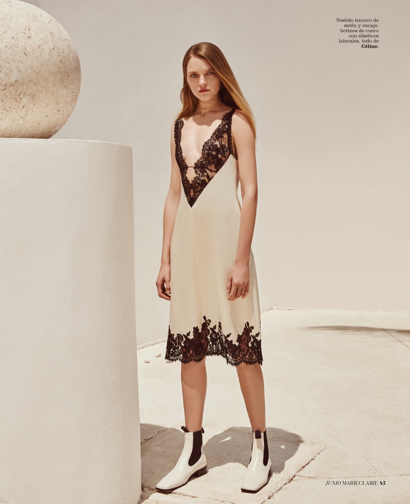 Vlada wears satin and lace dress by Celine