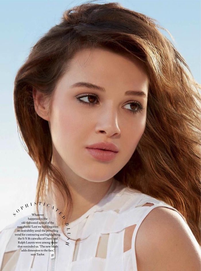 Ania Pouliot wears a touch of pink on her cheeks and lips