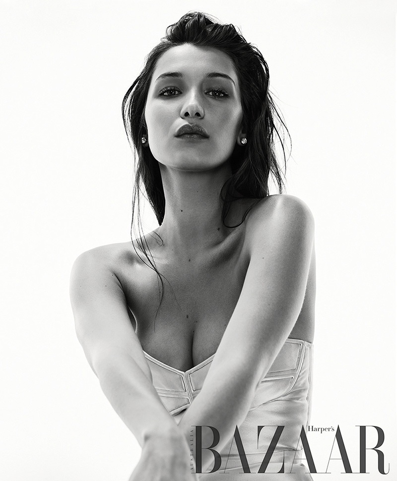 Photographed in black and white, Bella Hadid wears corset inspired top