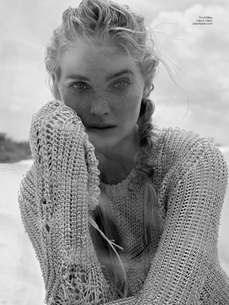 Photographed in black and white, Elsa Hosk wears a knit Calvin Klein piece