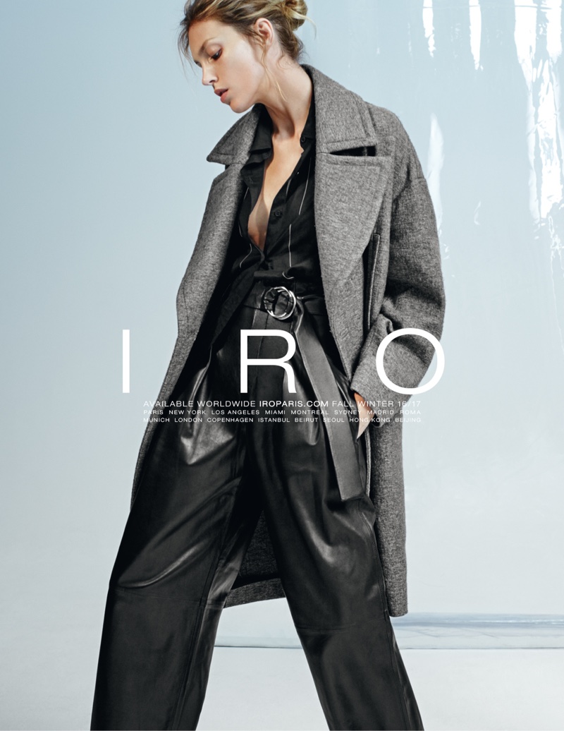 Anja Rubik models IRO's long coat and leather pants