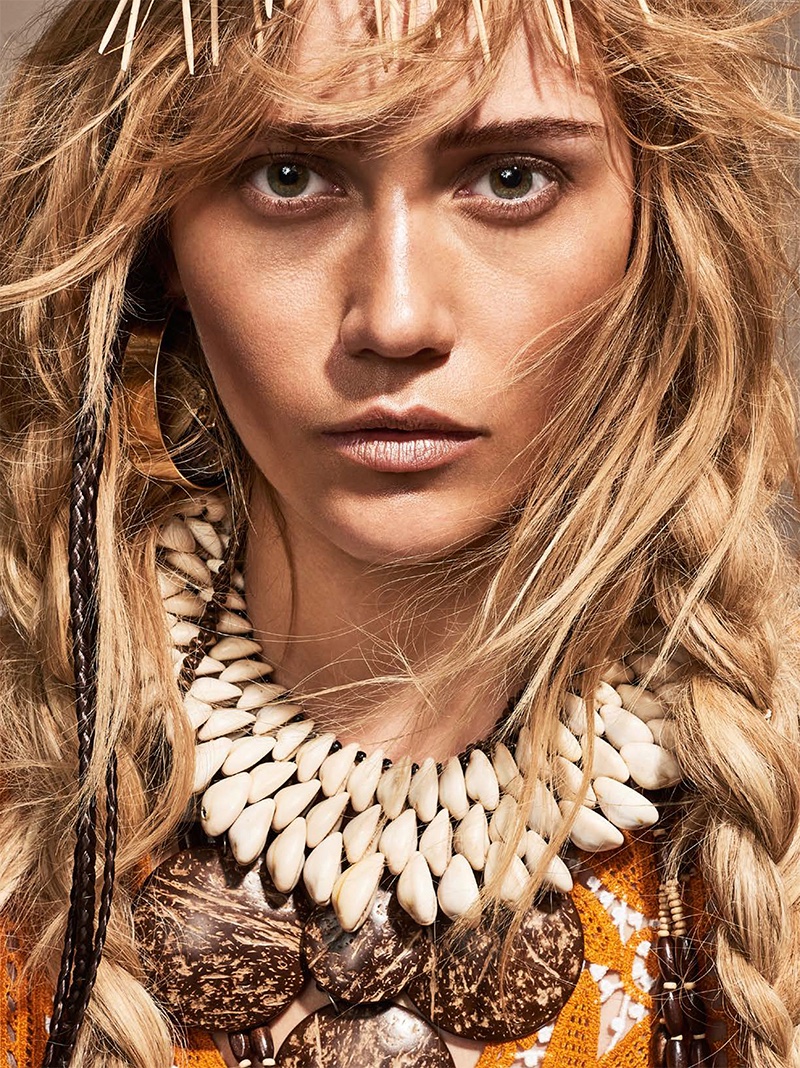 Photographed by Oliver Beckmann, the blonde model wears tribal chic fashions