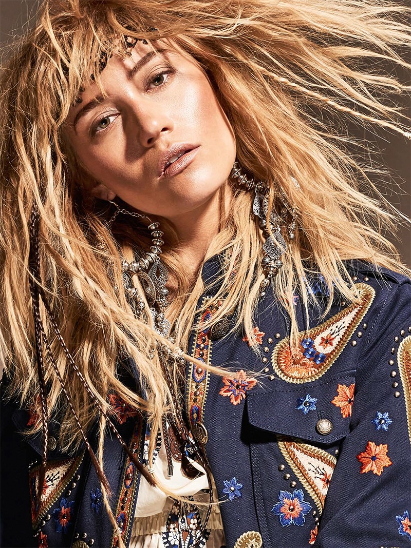 Josefin Bresan models wavy hairstyle with embroidered jacket from Fay