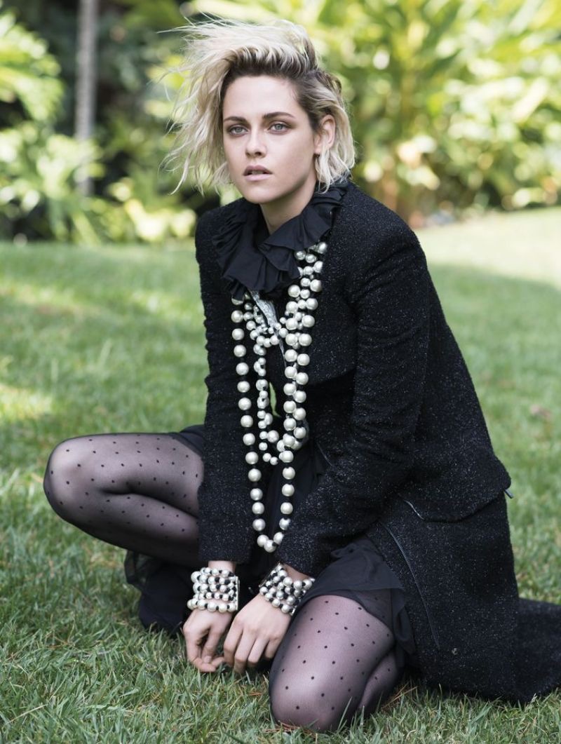 Kristen Stewart wears Chanel tweed jacket and pearl necklace with matching bracelets