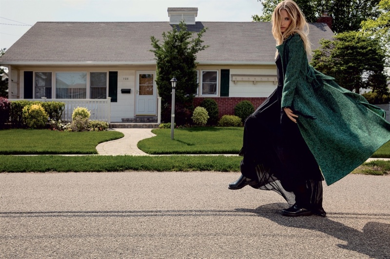 Natasha Poly models green coat and black dress in Twin-Set’s fall 2016 campaign