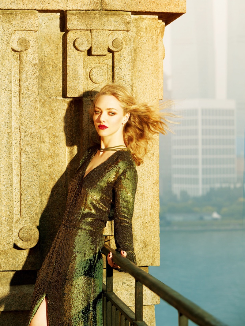 Amanda Seyfried poses in green sequin embellished dress from Nina Ricci