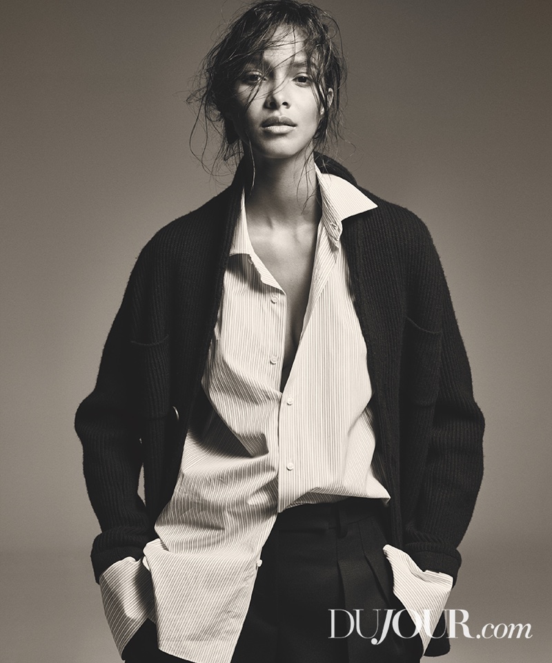 Lais Ribeiro wears Brunello Cucinelli cardigan, Isaia shirt and DKNY pants