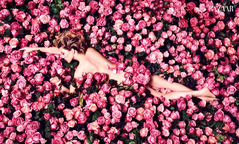 Léa Seydoux poses naked in a field full of flowers