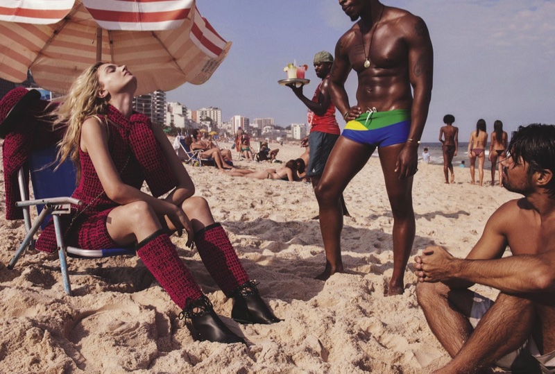 Lily Donaldson hits the beach in Chanel scarf, dress, boots and bag