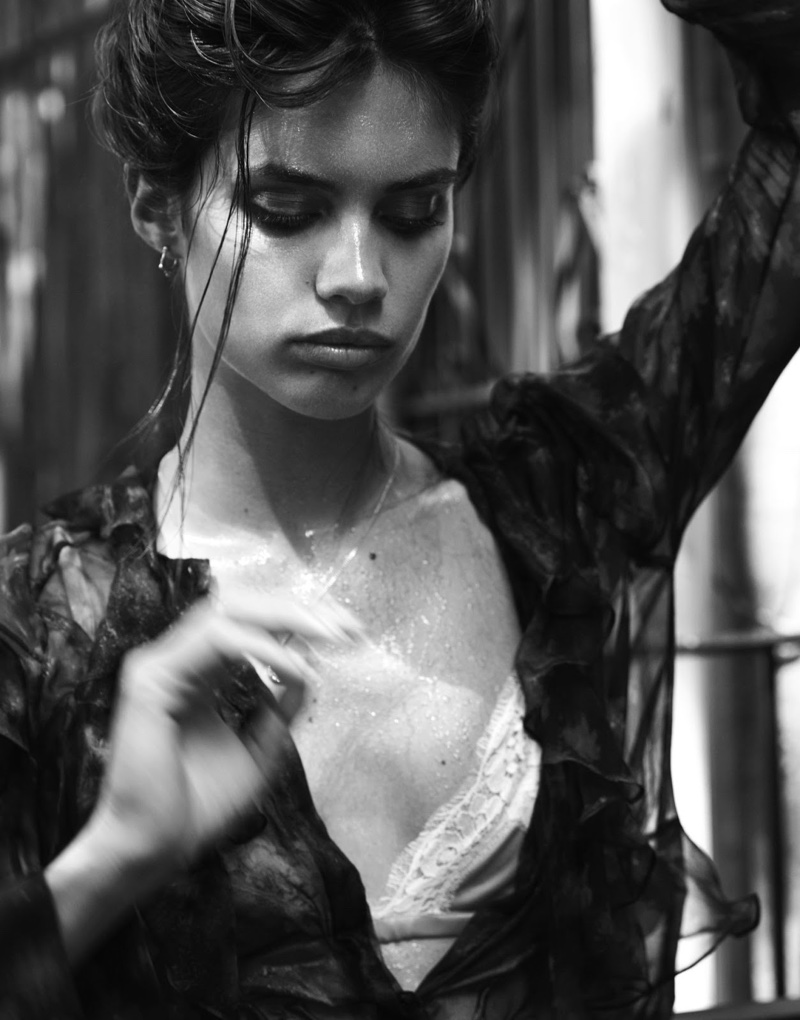 Sara Sampaio models printed Givenchy blouse with Dolce & Gabbana bra