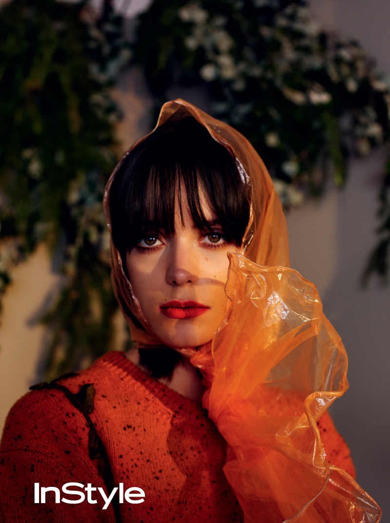 Stacy Martin serves retro beauty vibes with transparent scarf, blunt bangs and red lipstick