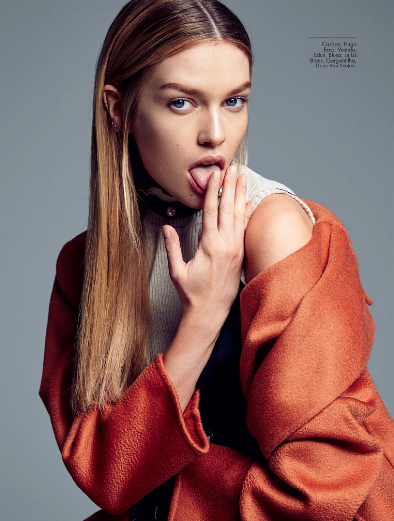 Photographed by Max Abadian, Stella Maxwell wears Hugo Boss jacket with Edun dress