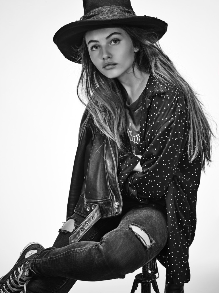Thylane Blondeau models L’Agence  leather jacket and jeans with Saint Laurent blouse