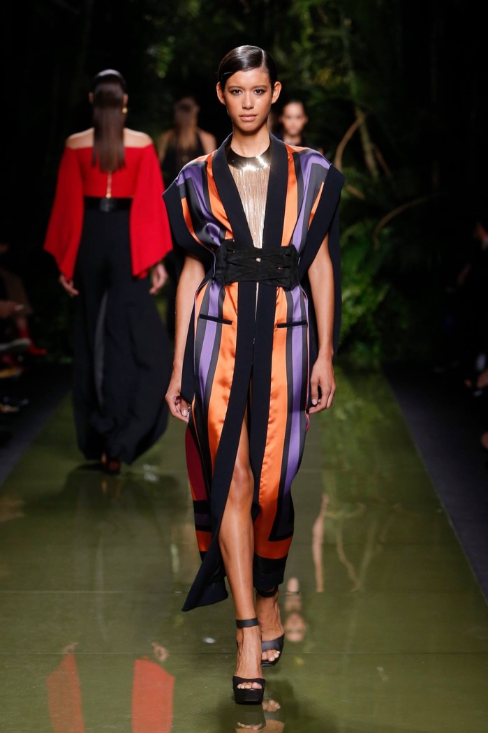 Balmain Spring 2017: Model walks the runway in sleeveless jacket with stripes