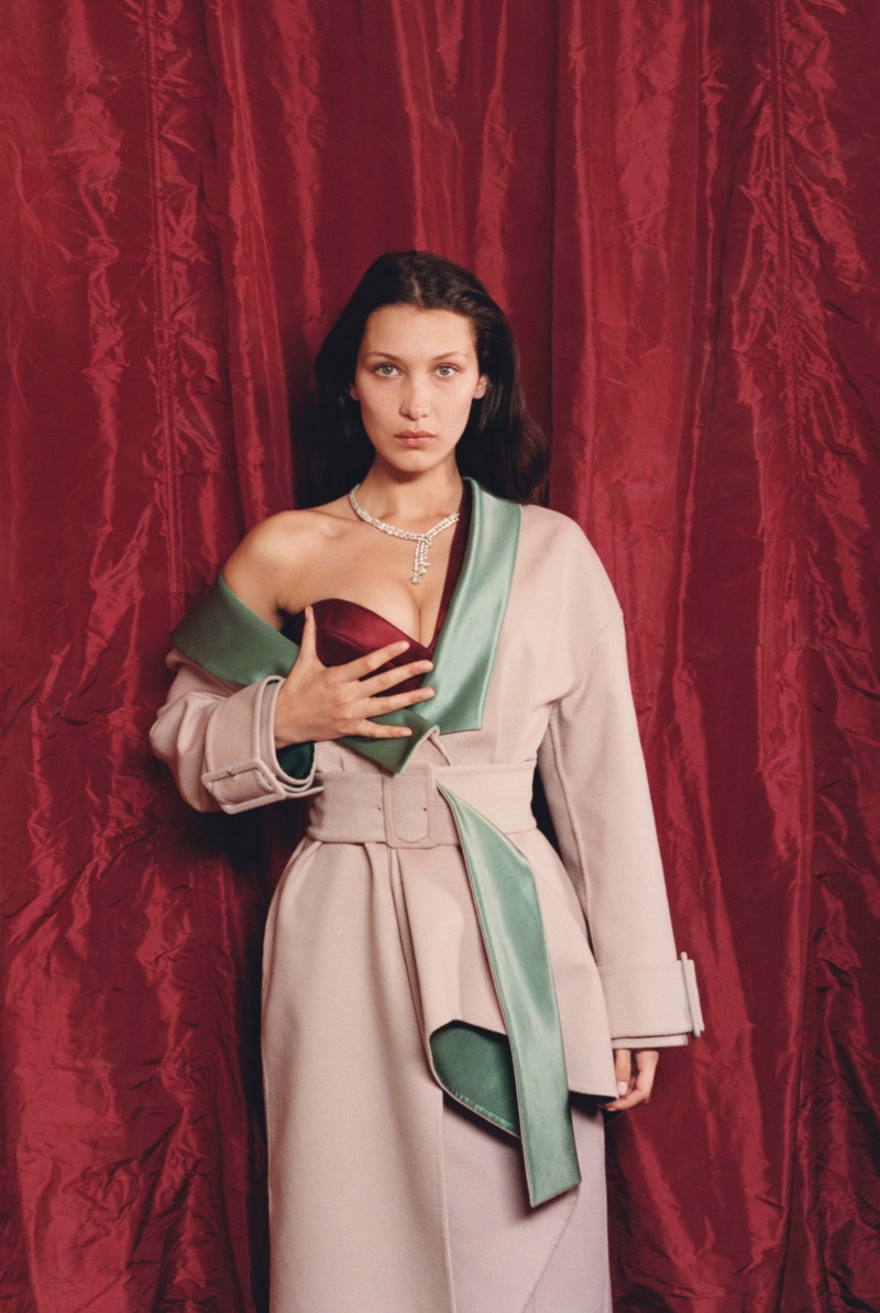 Bella Hadid wears draped coat and dress from Atelier Versace