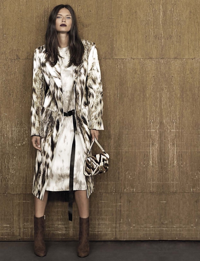 Bianca Balti models printed jacket and dress with ankle boots