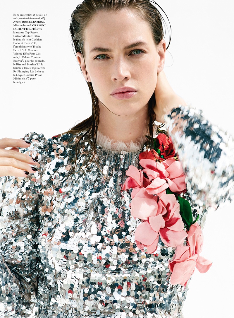 Crista Cober wears sequin embellished dress from Dolce & Gabbana with silk flower detail