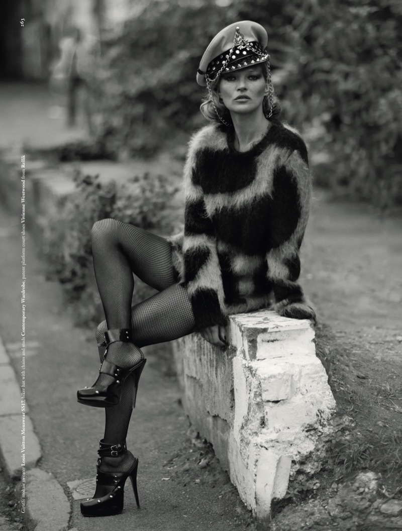 Kate Moss models Louis Vuitton sweater with Vivienne Westwood platform heels