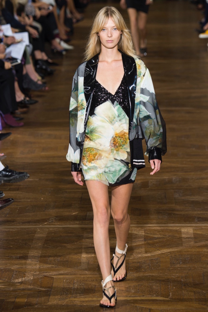 Lanvin Spring 2017: Model walks the runway in floral print bomber jacket over matching minidress