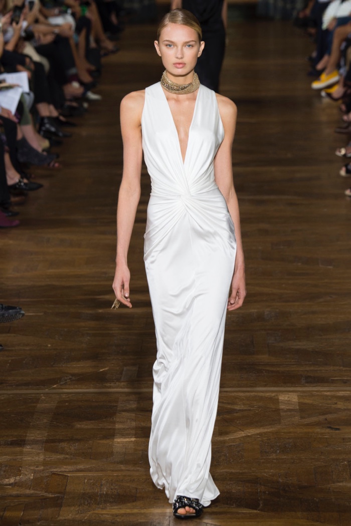Lanvin Spring 2017: Romee Strijd walks the runway in white gown with plunging neckline and pleated detail
