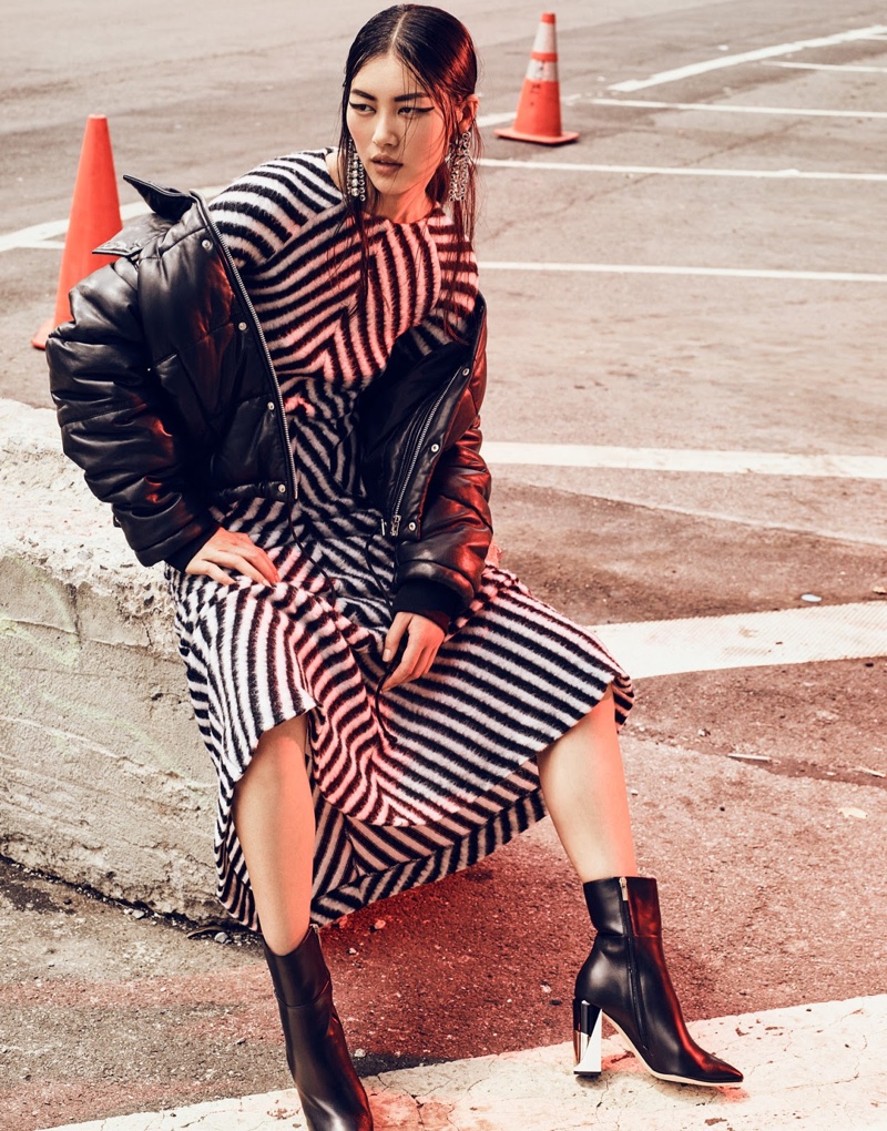 Model Liu Wen gets graphic in McQ Alexander McQueen leather jacket, striped dress from Haider Ackermann and Jimmy Choo boots 