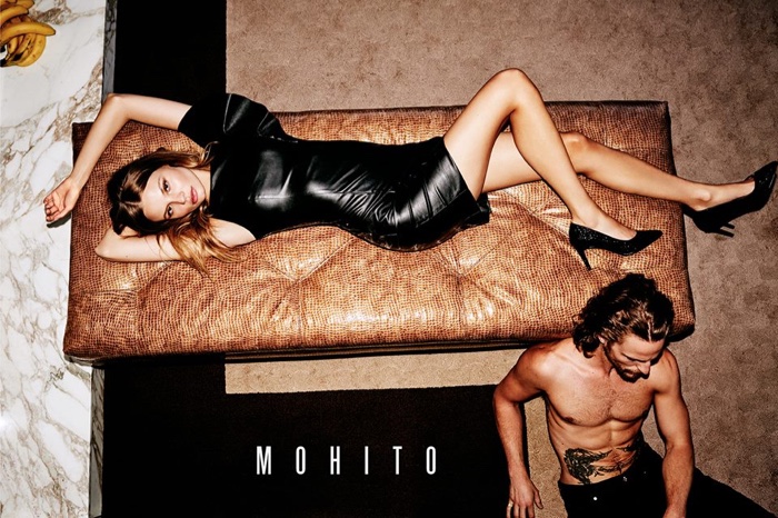 Magdalena Frackowiak poses in faux leather dress from Mohito