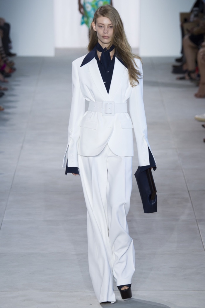 Michael Kors Spring 2017: Ondria Hardin walks the runway in white pantsuit with belt