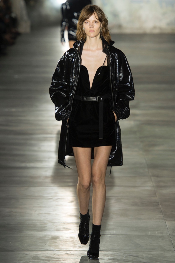 Saint Laurent Spring 2017: Freja Beha Erichsen walks the runway in lacquered leather coat over short dress