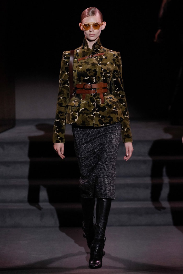 Tom Ford Fall 2016: Ondria Hardin walks the runway in camouflage print jacket, harness belt and mid-length skirt