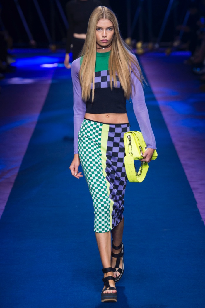 Versace Spring 2017: Stella Maxwell walks the runway in long sleeve crop top and pencil skirt with checkered prints