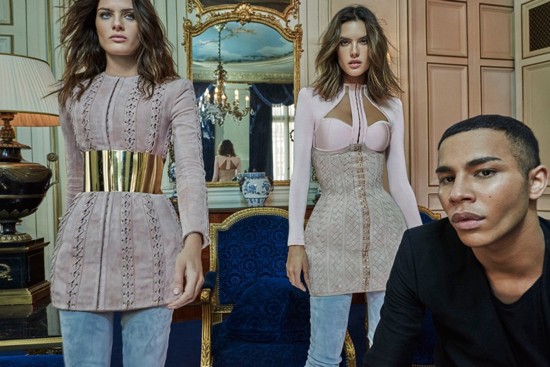 Models Isabeli Fontana and Alessandra Ambrosio poses for pictures with Balmain creative director, Olivier Rousteing.
