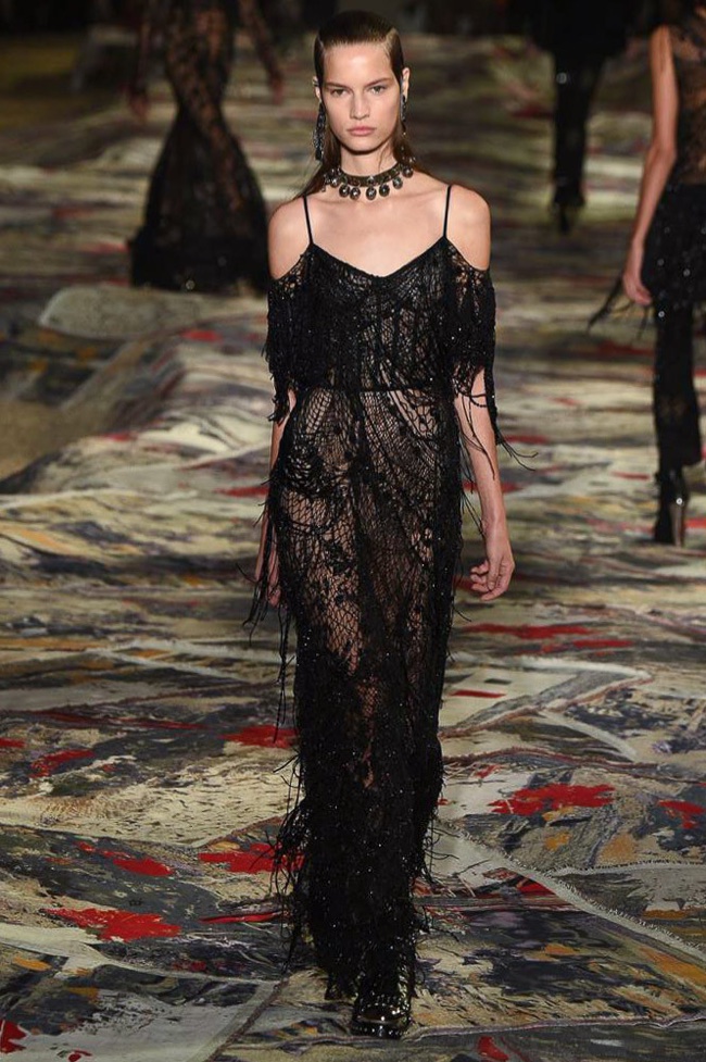 Alexander McQueen Spring 2017: Model walks the runway in sparkling, off-the-shoulder black gown