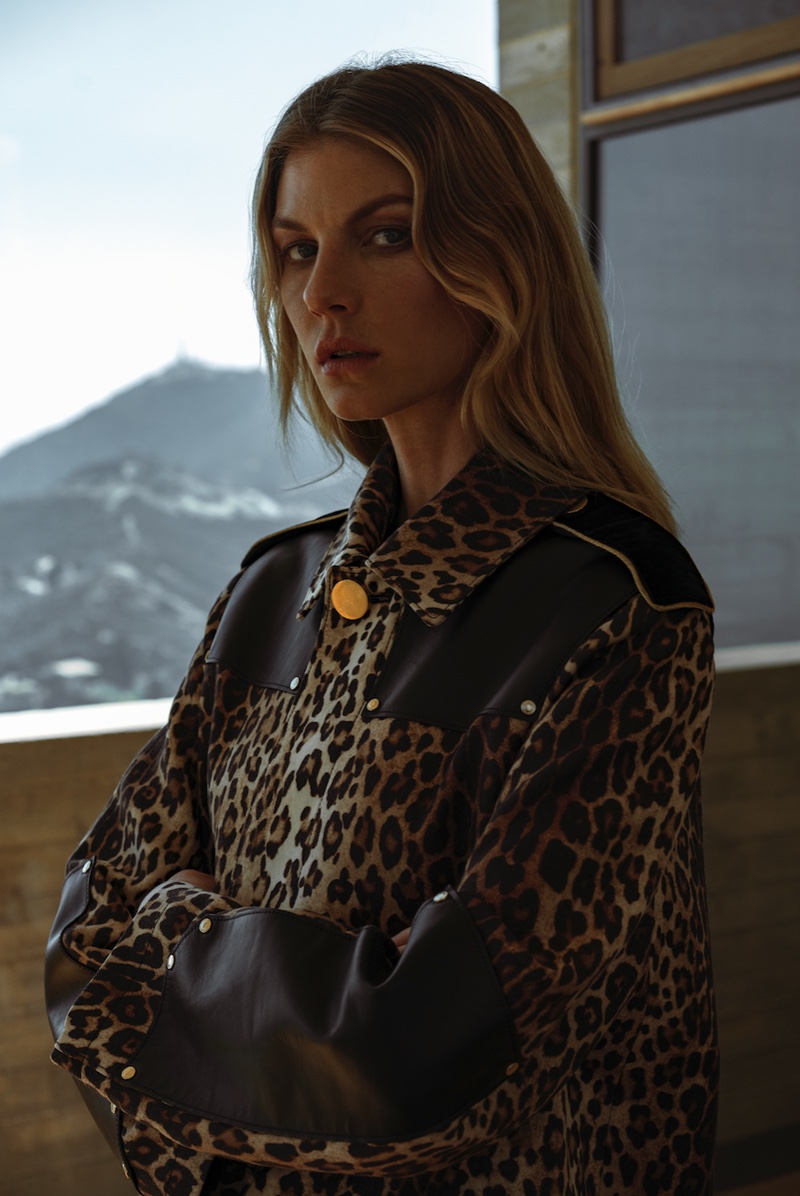 Angela Lindvall poses in Givenchy leopard print coat with leather detail