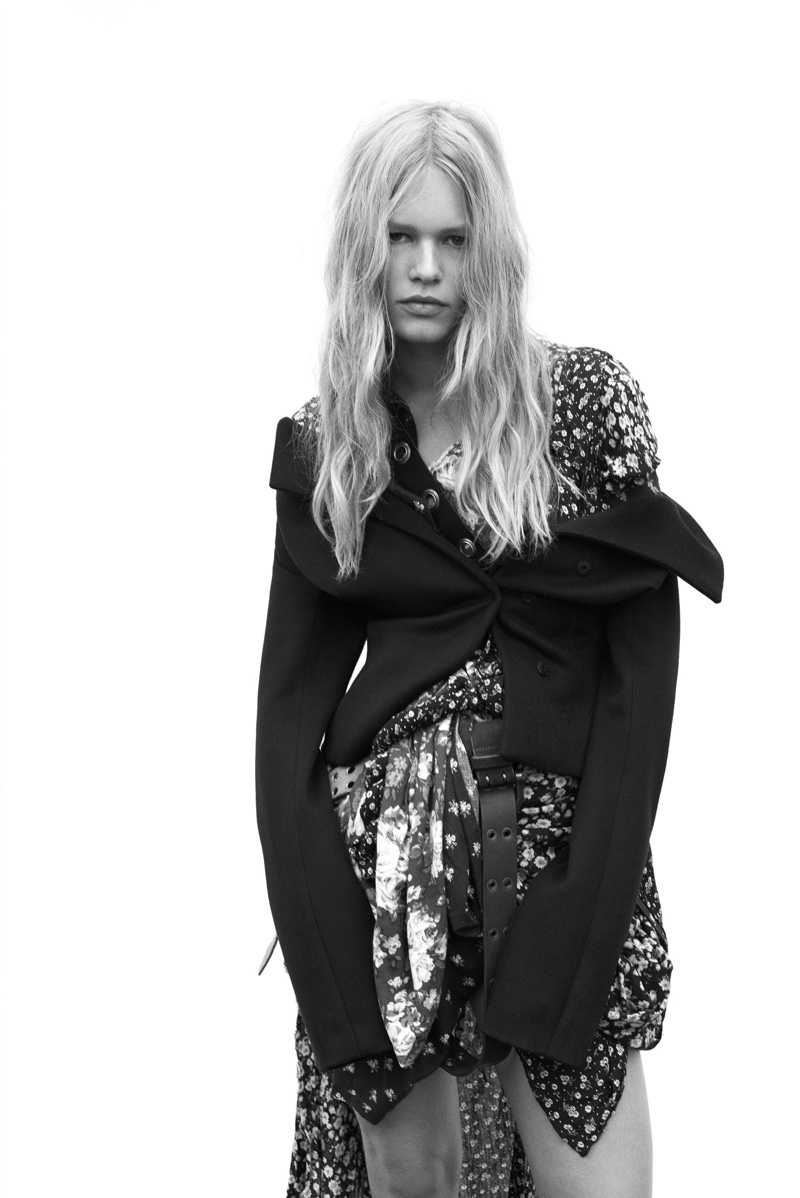 Photographed in black and white, Anna Ewers wears Dior jacket with stylist’s own dress