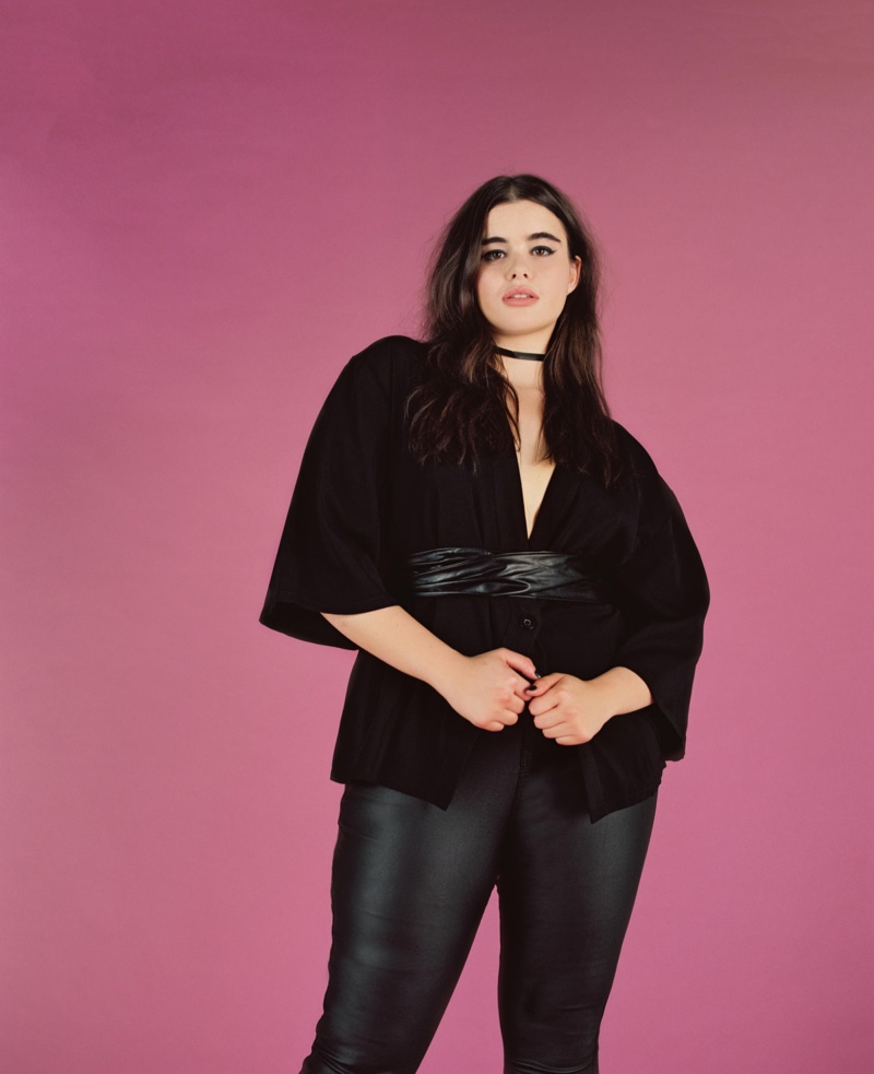 Clad in black, Barbie Ferreira wears Missguided+ kimono-sleeve jacket and faux leather pants