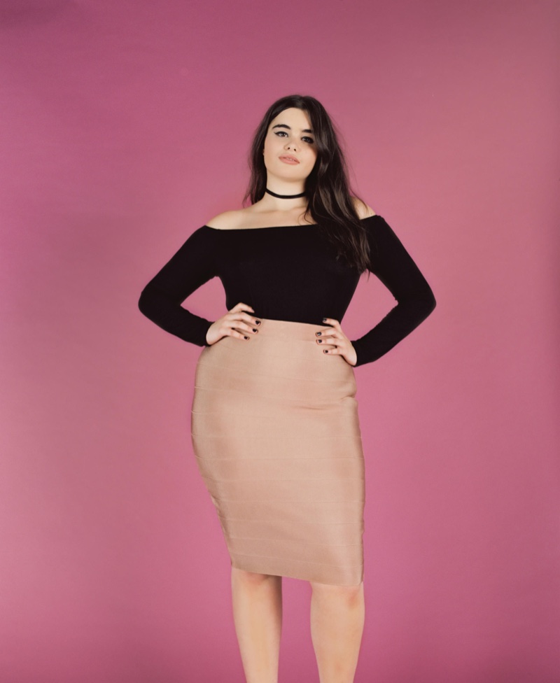 Model Barbie Ferreira poses in off-the-shoulder top with pencil skirt from Missguided
