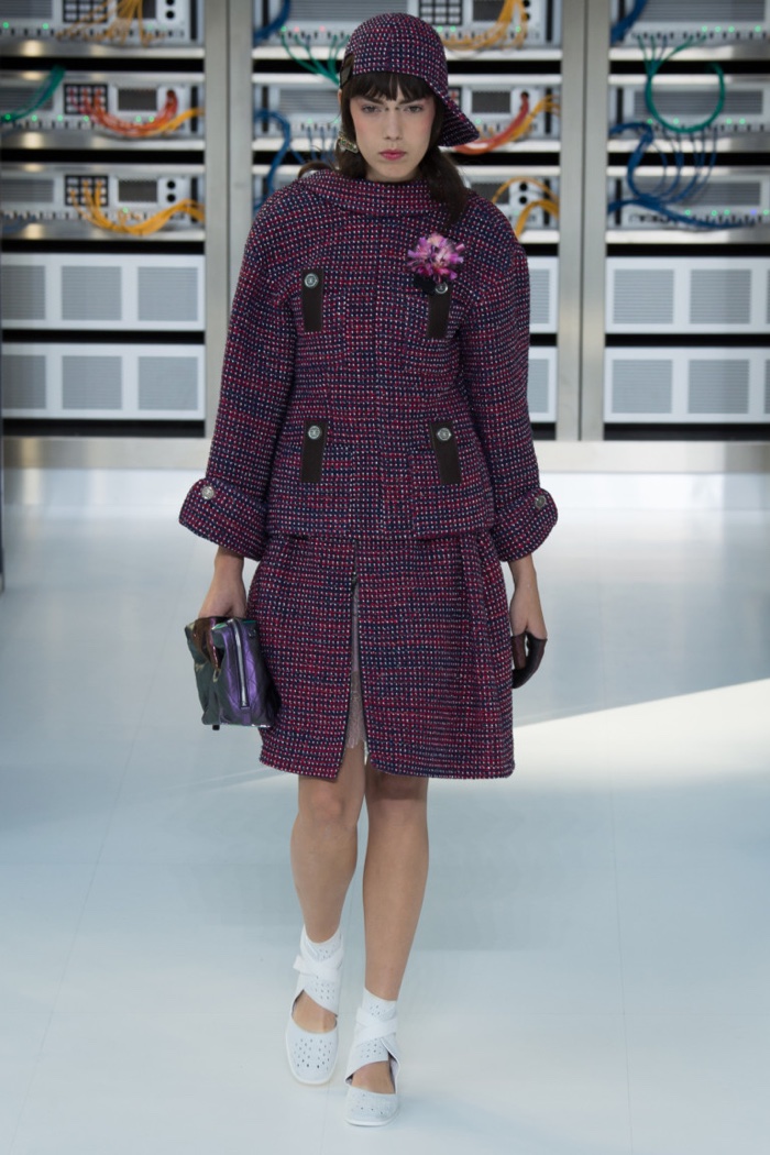 Chanel Spring 2017: Model walks the runway in tweed dress coat with baseball cap