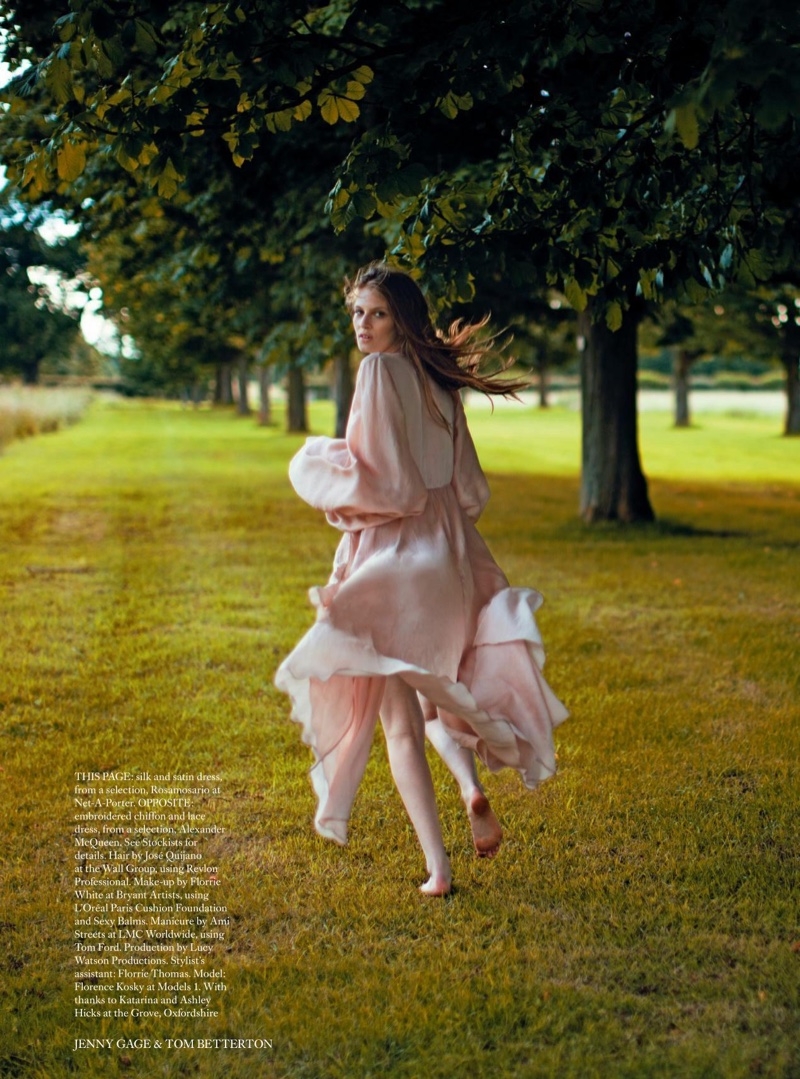Going barefoot, the model wears a silk and satin dress from Rosamosario