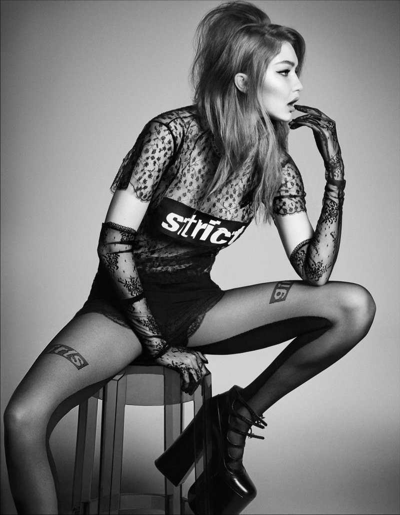 Sitting on a stool, Gigi Hadid models Alexander Wang 'Strict' top
