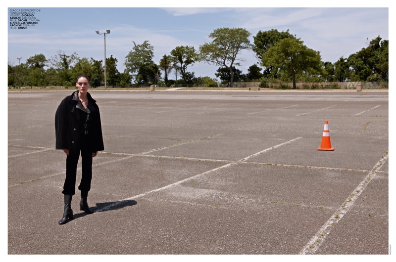 Posing in a parking lot, Hilary Rhoda jacket and ants with Chloe boots