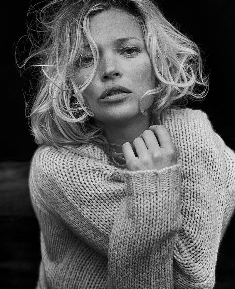 Cozying up, Kate Moss poses in Naked Cashmere’s Jean sweater