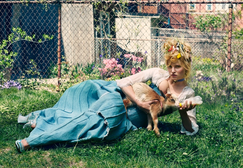 Looking like a modern day Marie Antoinette, Lara Stone wears a denim corset and skirt over a lace top