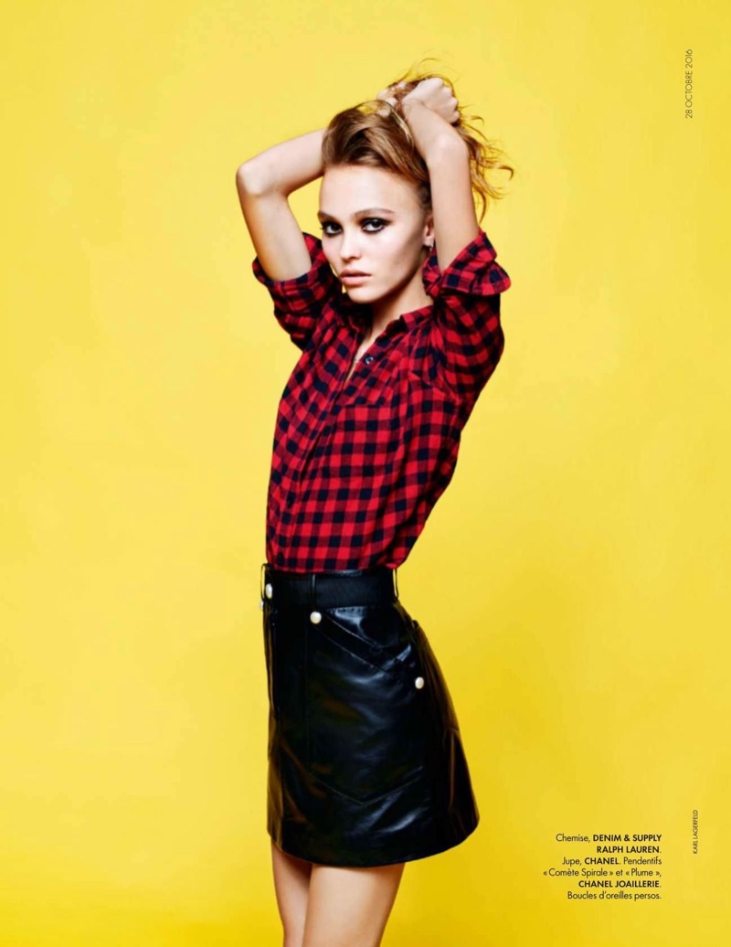 Looking rad in plaid, Lily-Rose Depp poses in Denim & Supply by Ralph Lauren top with Chanel leather skirt