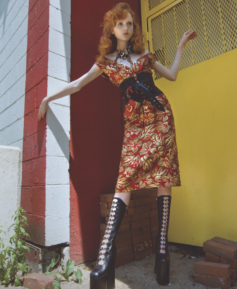 Model Maddison Stubbington poses in Prada brocade dress with wool corset