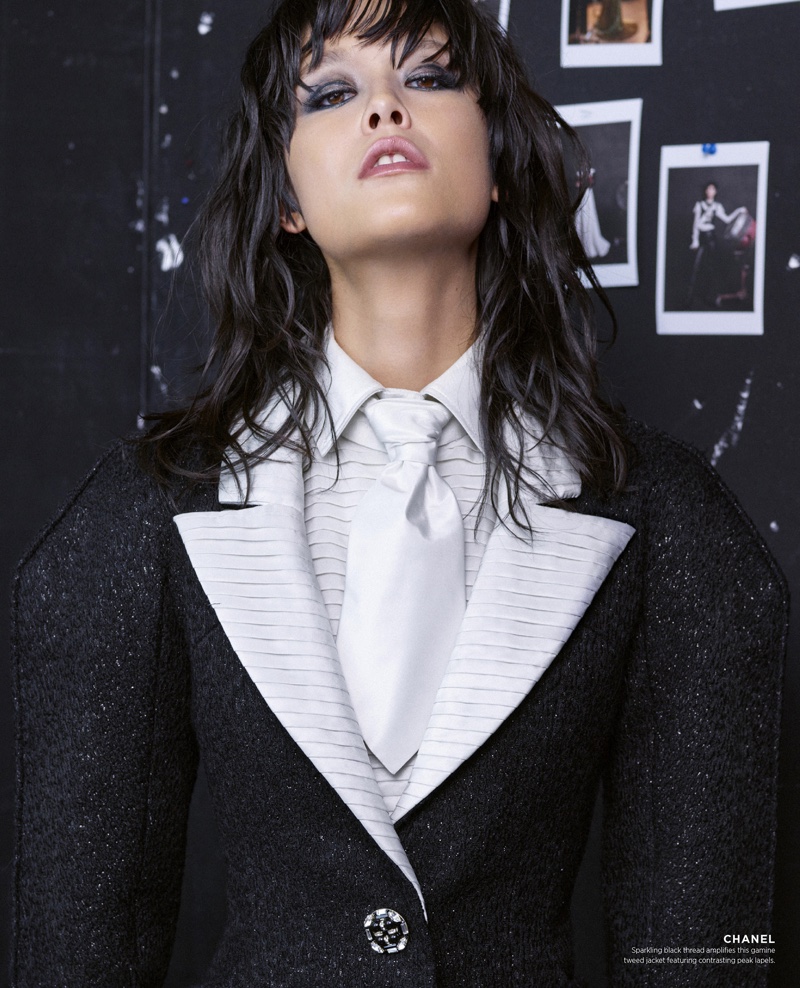 Mae Lapres poses in Chanel Haute Couture tweed jacket with sparkling black thread